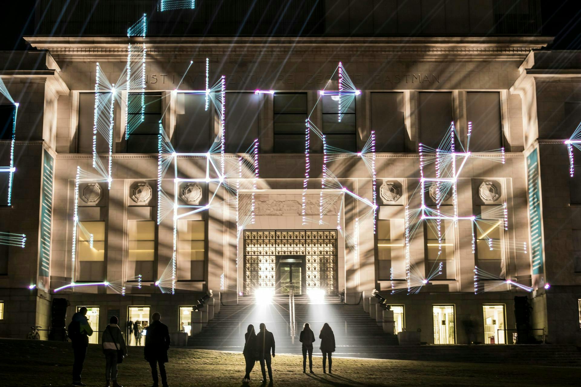 person human pedestrian lighting building architecture