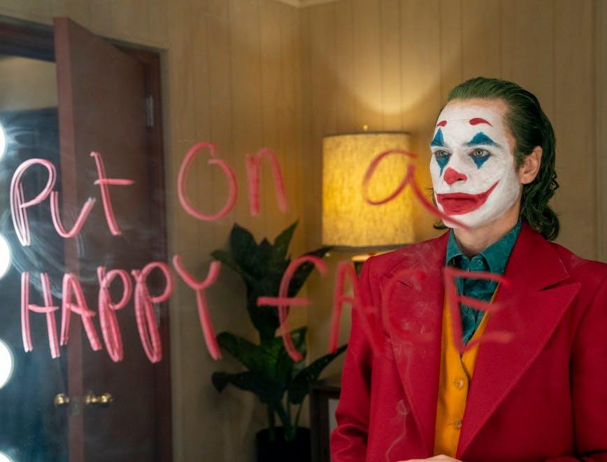 arthur fleck/joker-joaquin phoenix performer person human clown