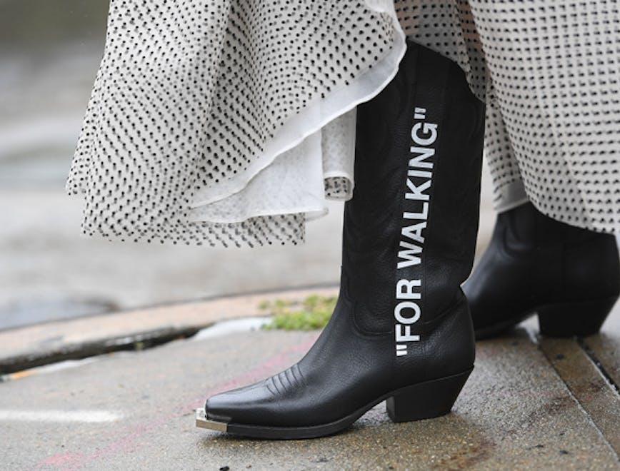 street style spring summer 2019 new york fashion week usa 10 sep 2018 nyfw ss19 alone female not-personality 74422054 clothing apparel footwear riding boot boot