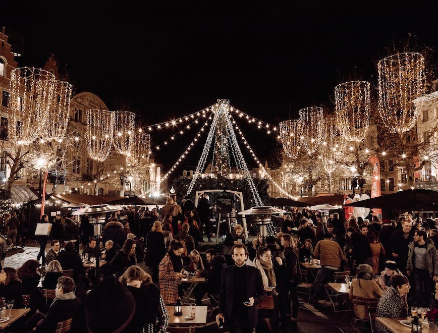 person downtown city urban building metropolis architecture crowd lighting restaurant