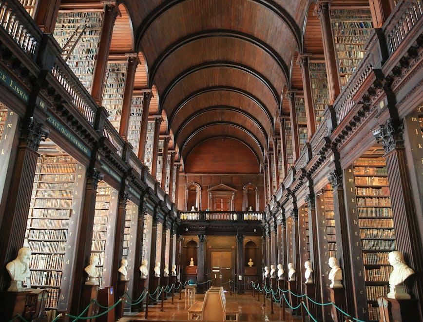 dublin,feature,illustrative,touristy,heritage,books,european cap dublin corridor architecture building flooring person human indoors aisle arch arched