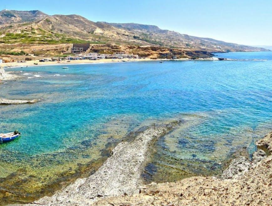 shoreline water sea nature outdoors land coast lagoon promontory rock