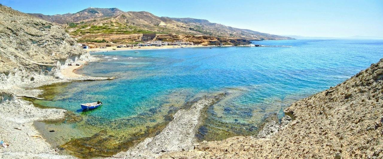 shoreline water sea nature outdoors land coast lagoon promontory rock