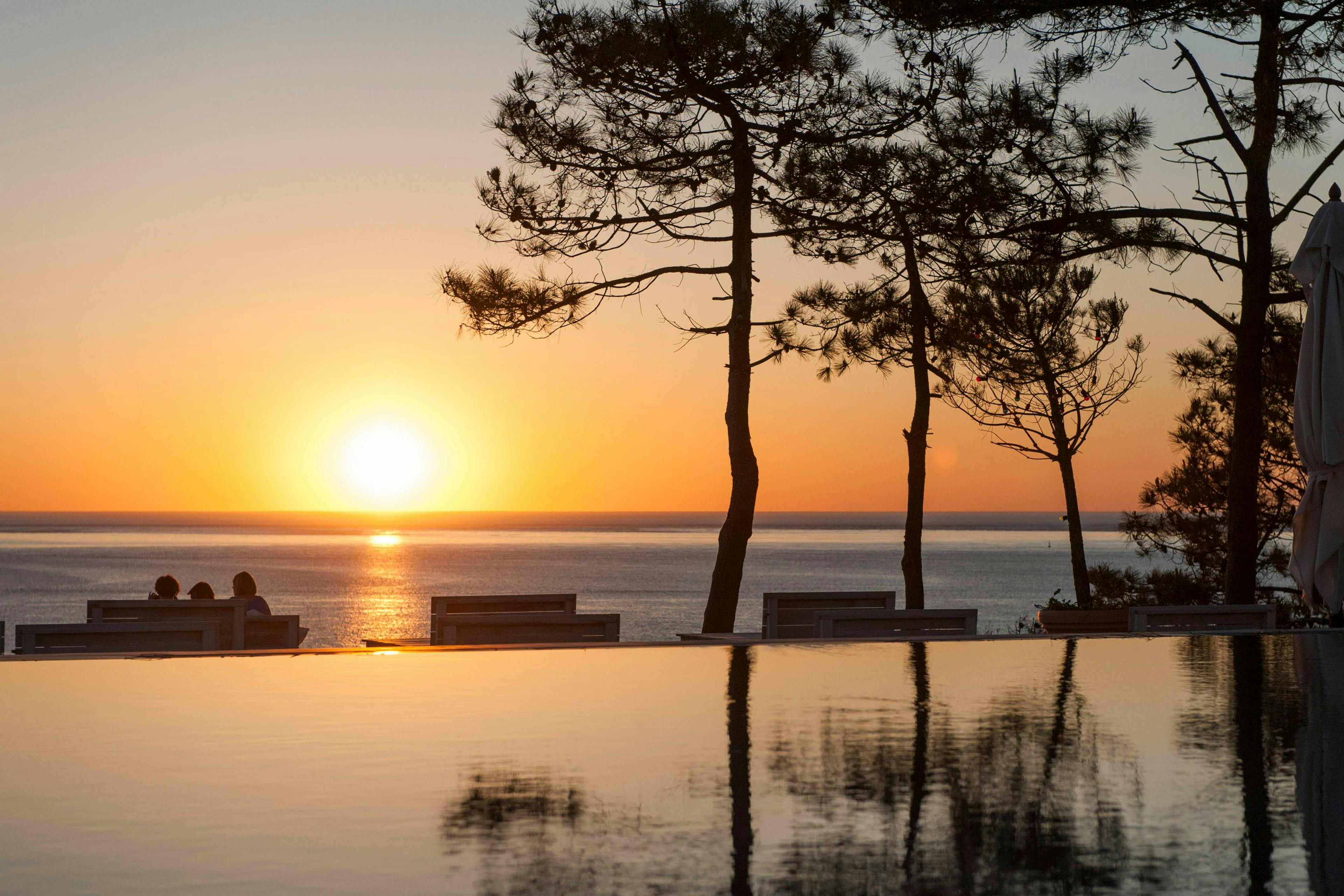 waterfront water nature pier dock port outdoors sky sunset dusk