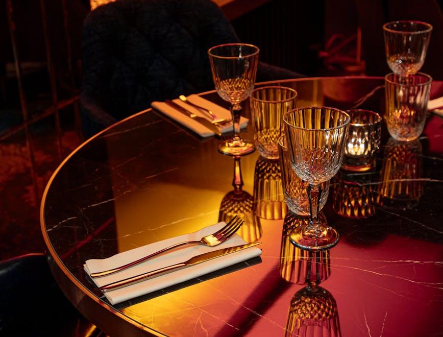 glass goblet table furniture dining table fork cutlery tabletop pub