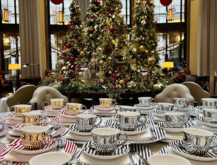 cup dining room table dining table christmas decorations festival christmas person christmas tree fork