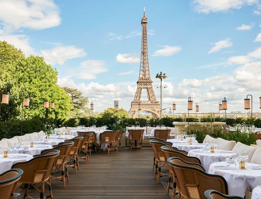 chair furniture cup indoors candle table building eiffel tower landmark tower