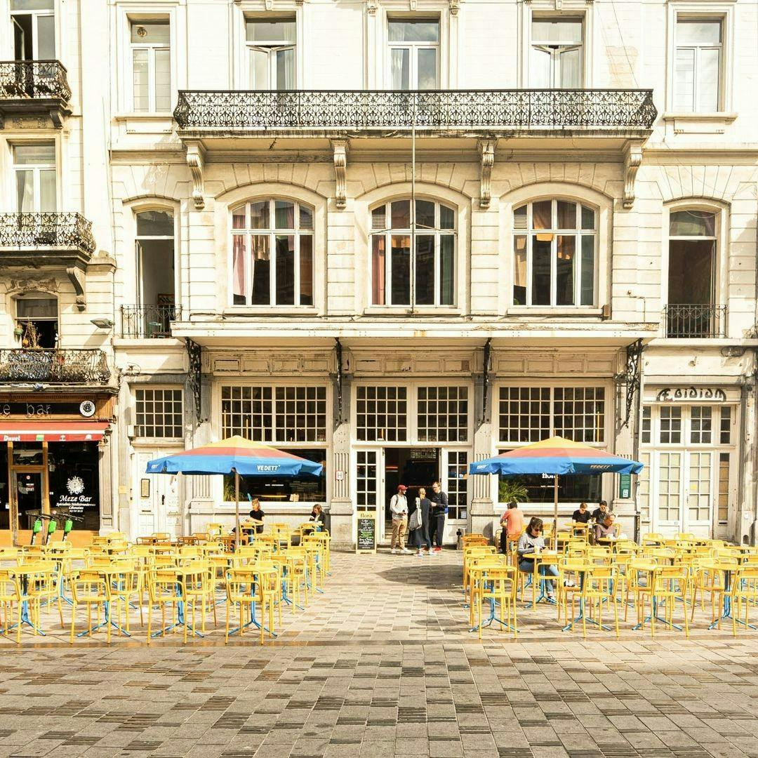 urban city indoors restaurant cafe cafeteria street architecture building person