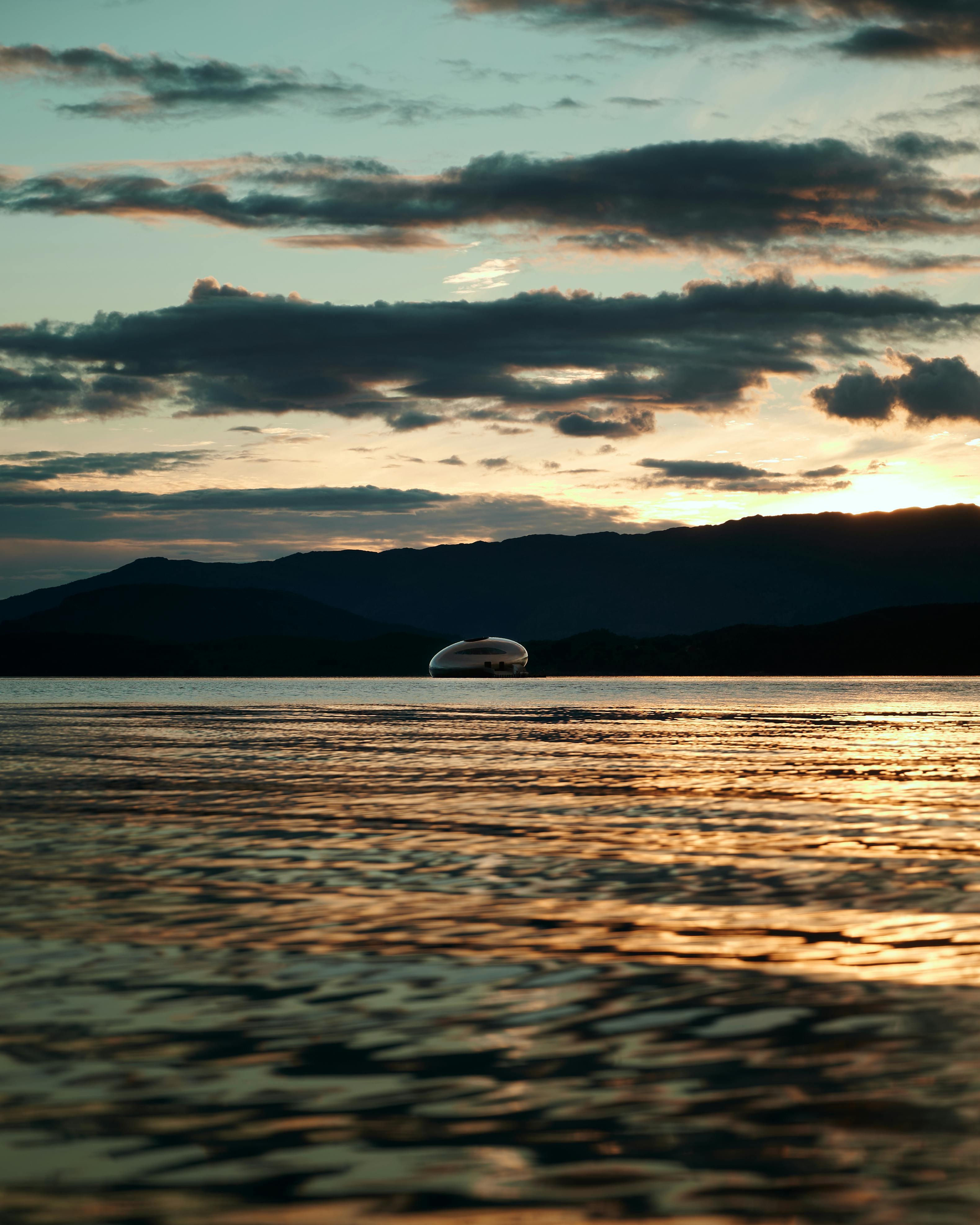 nature outdoors sky sunset sunlight scenery sea water boat sailboat