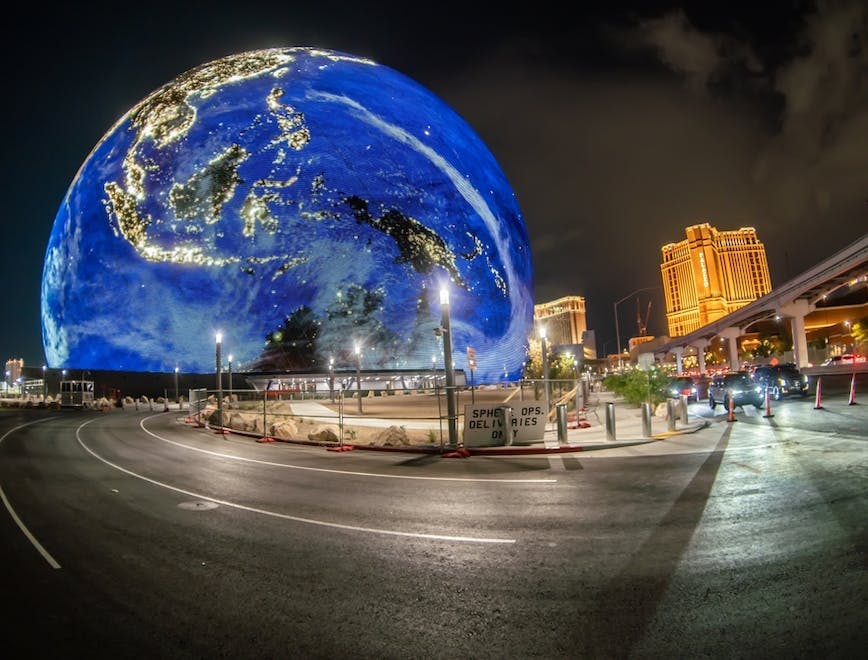 msg,entertainment,exterior,spherical,screen,united states,illustrative,led,arena,building,building exterior,art installation,exosphere,basketball,venetian,music,sphere,entertainment venue,nobody,2023 las vegas,light show,architecture,editorial,sky,venetian resort,nevada,resort area,display,recreation,2023,equipment,structure,you too,blue,lighting debut,closeup,light,earth,may 31,msg sphere,illuminated,paradise,madison square garden,las vegas strip,no people,street photography sphere road city freeway building urban metropolis car outer space planet