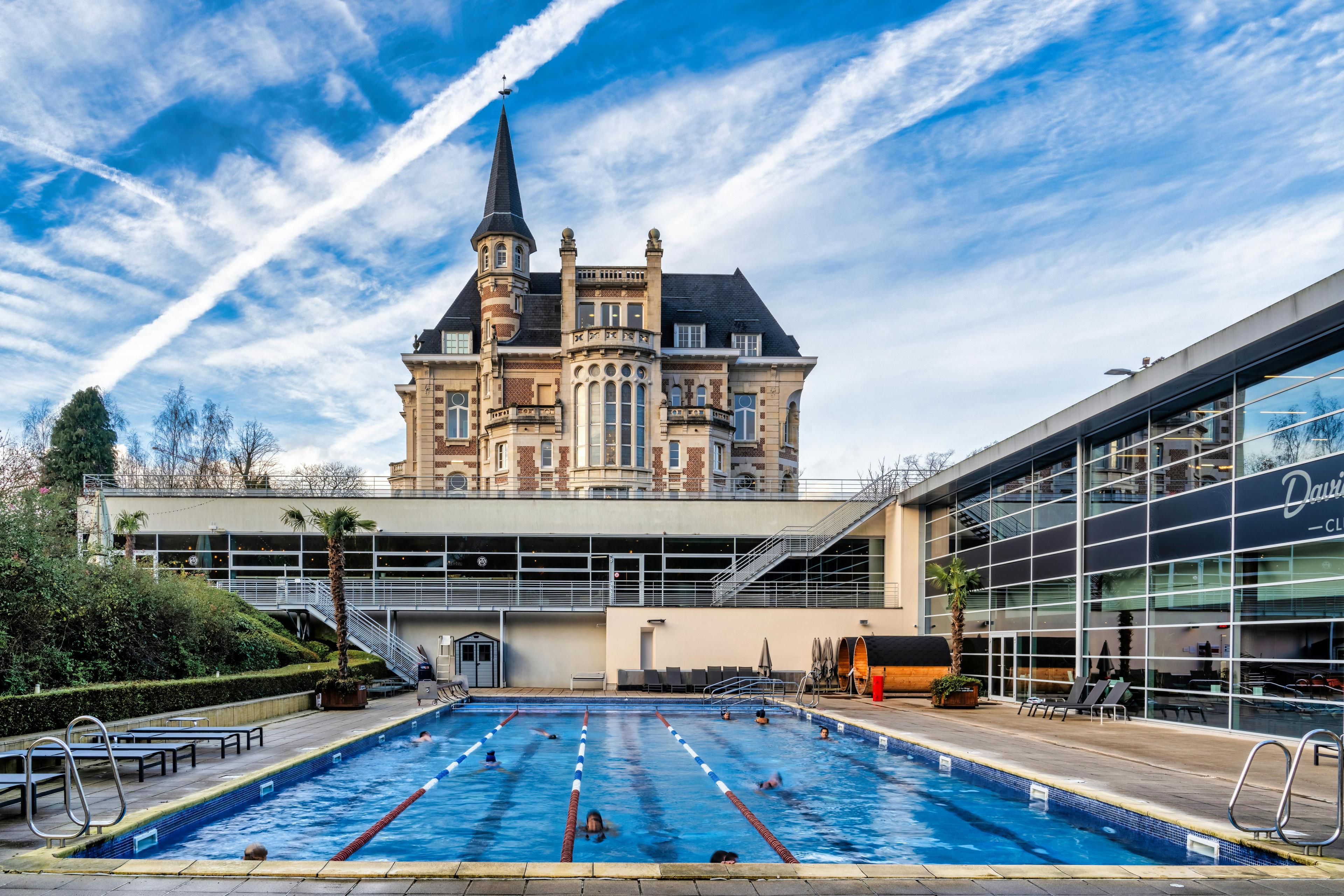 plant pool water swimming pool spire city person hotel urban outdoors