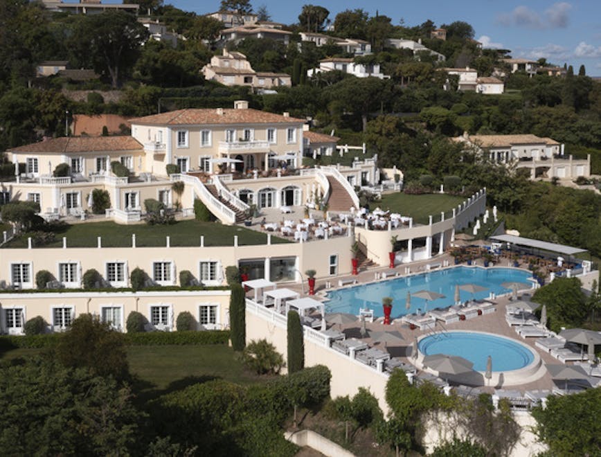 building hotel resort housing villa pool water swimming pool outdoors aerial view