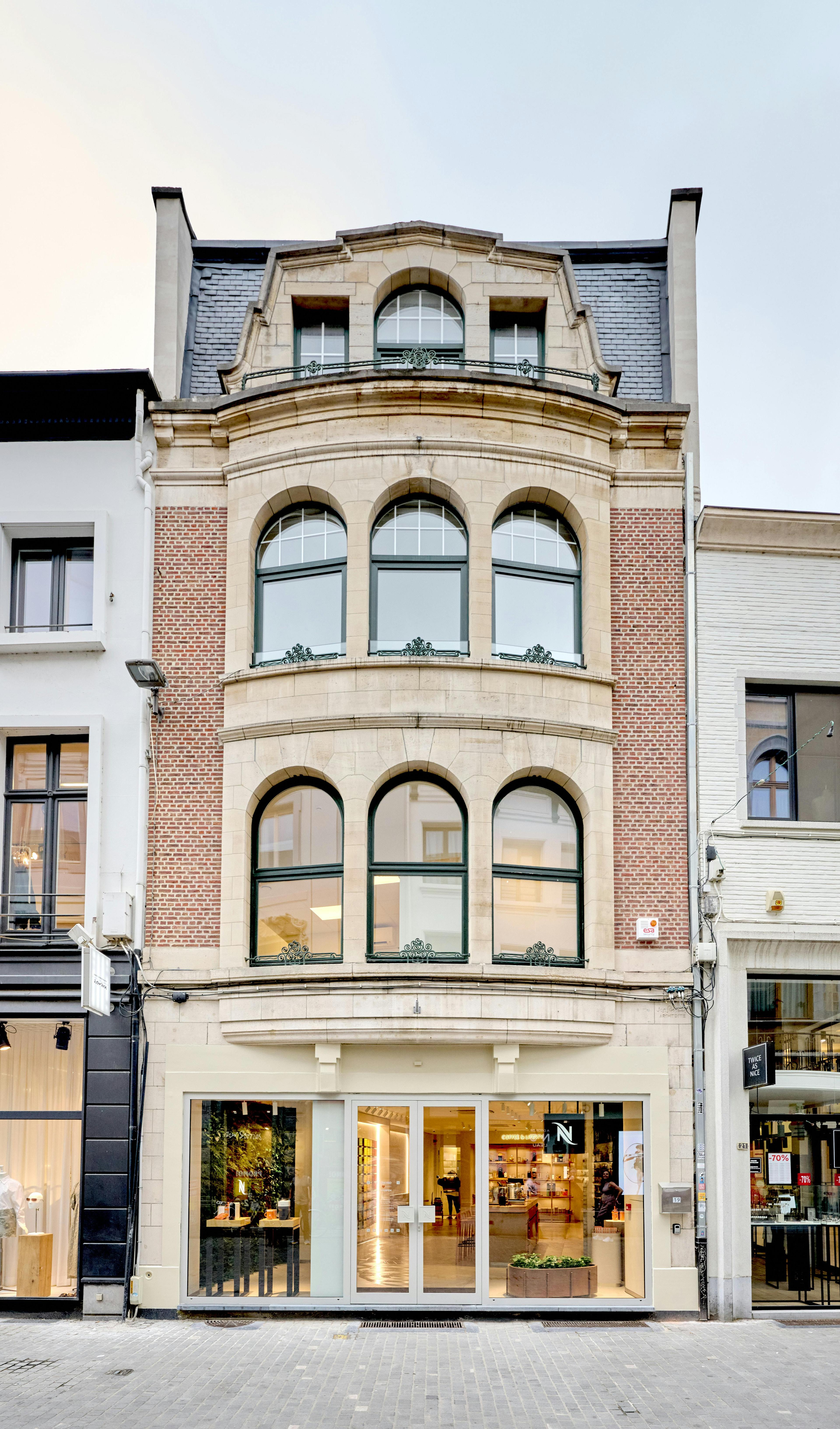 city urban window person plant architecture building office building